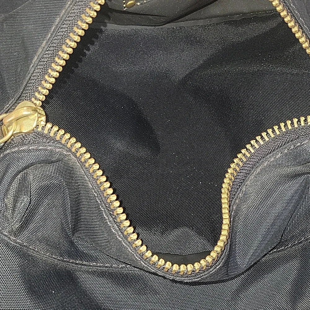 Frye Nylon Black and Brown Leather Trim Backpack with Gold Accents